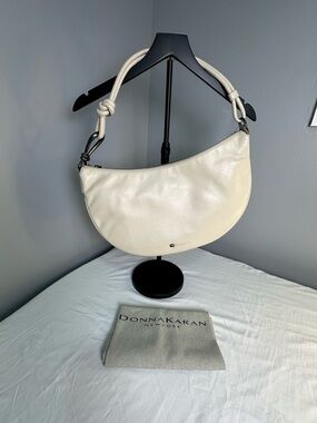 Donna Karan Off-White Leather Crescent Shoulder Bag with Knotted Strap